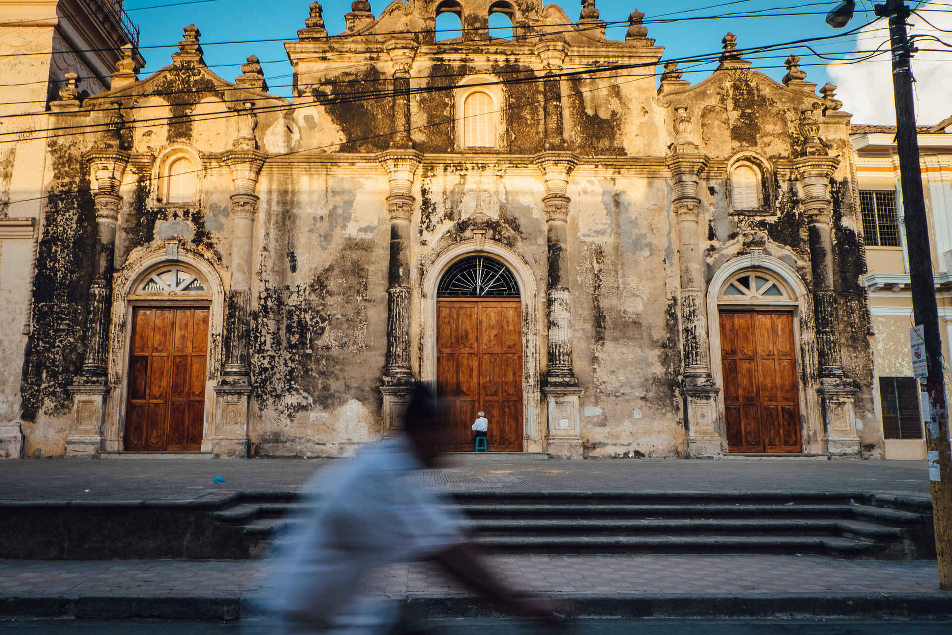 Man prays at church in Granada, Nicaragua