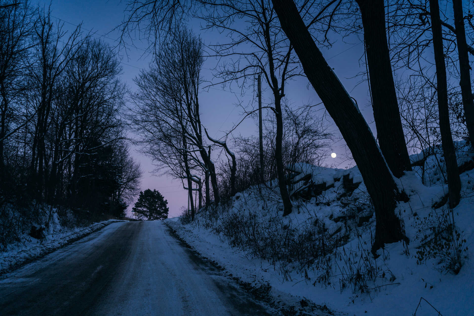 Snowy, rural road at Blue hour near ‎⁨Magnolia⁩, ⁨Illinois